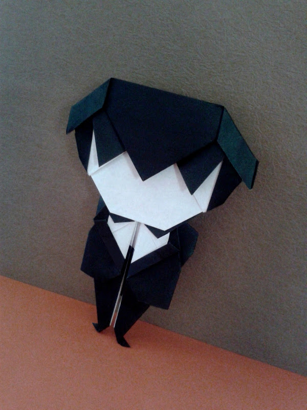 Homme avec nœud de papillonOrigami